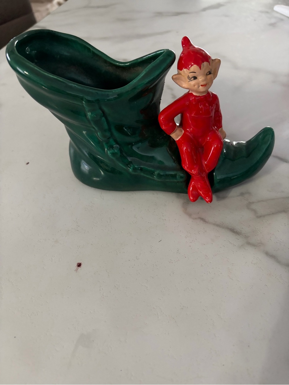 Vintage mid century ceramic pixie elf on a green boot 1950s